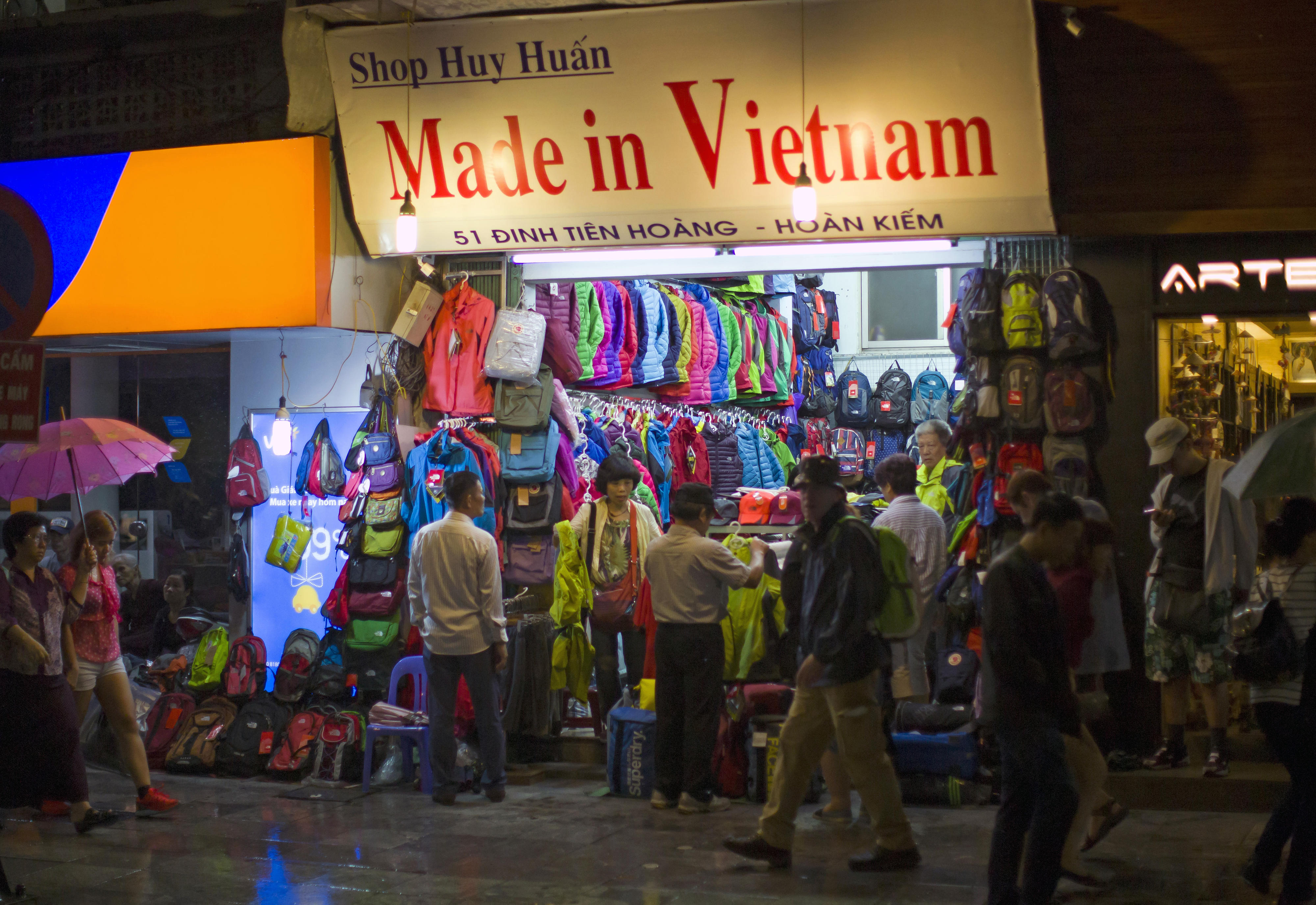 A shopping street in Hanoi by night