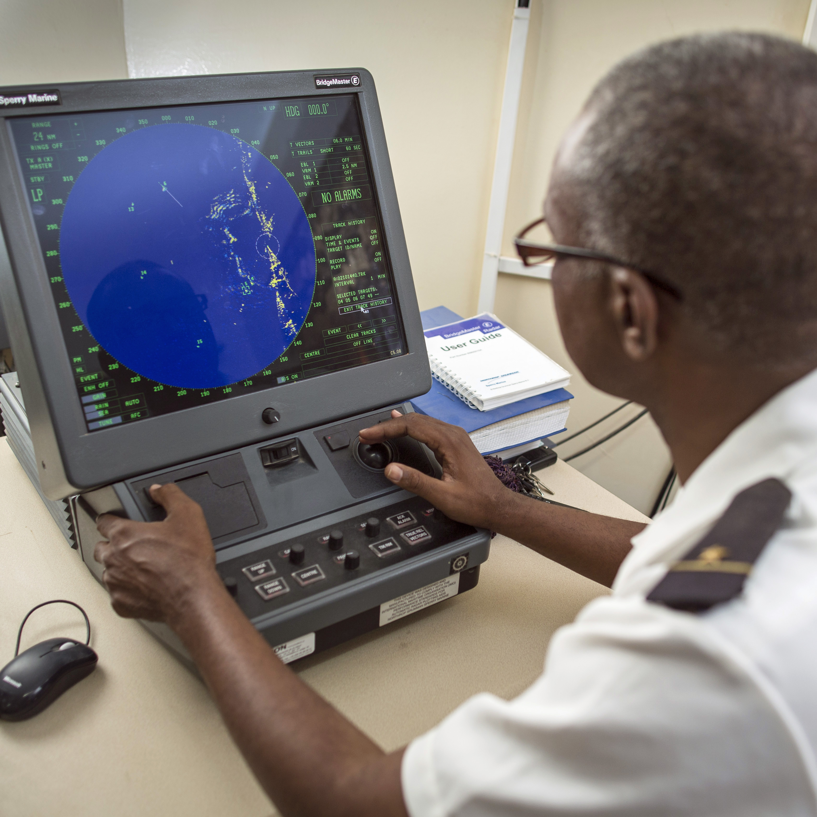An officer of the Mauritanian coast guard monitoring fisheries using radar