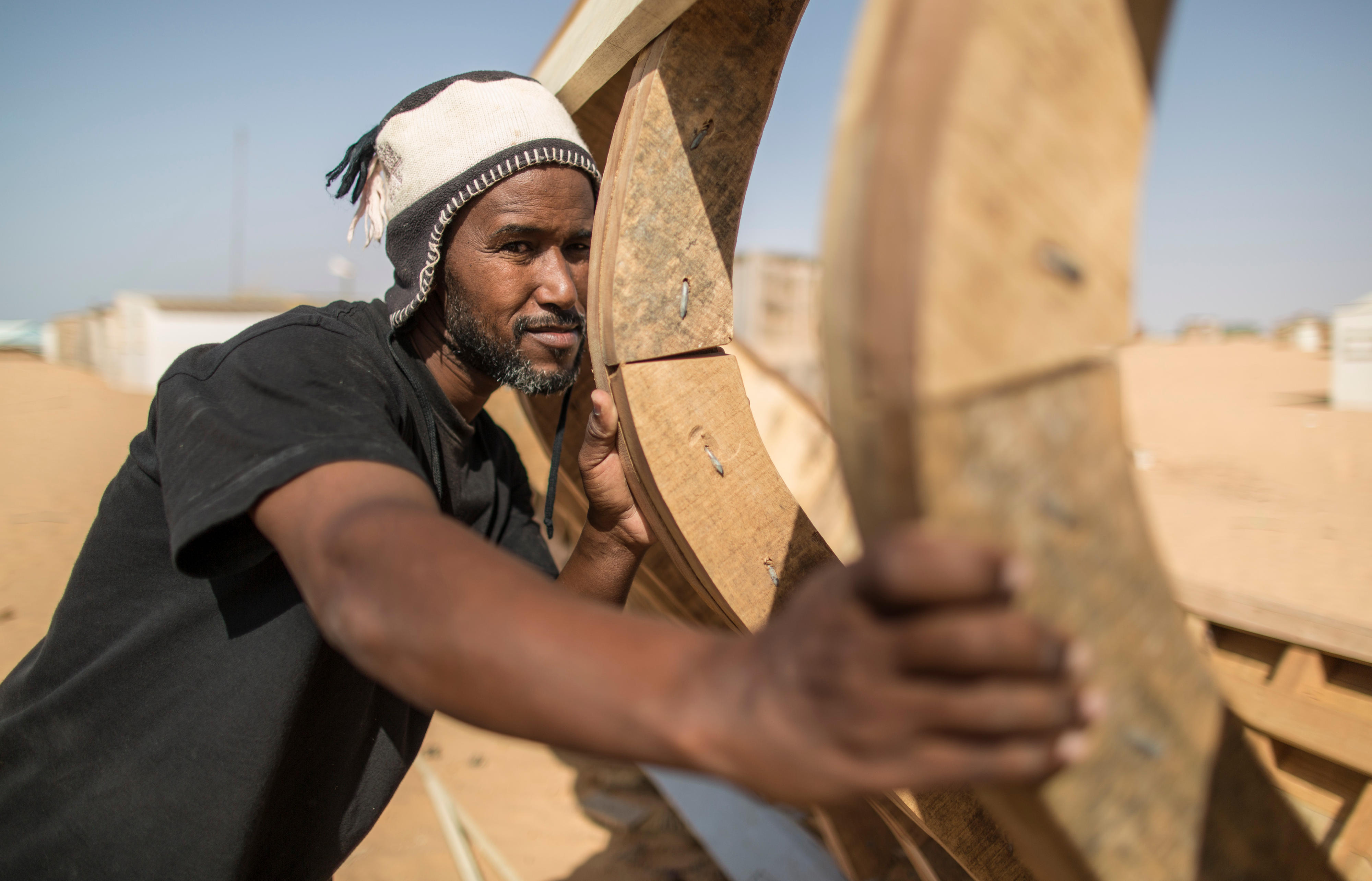 Boat builder in R'Gueiba, Banc d'Arguin National Park, Mauritania
