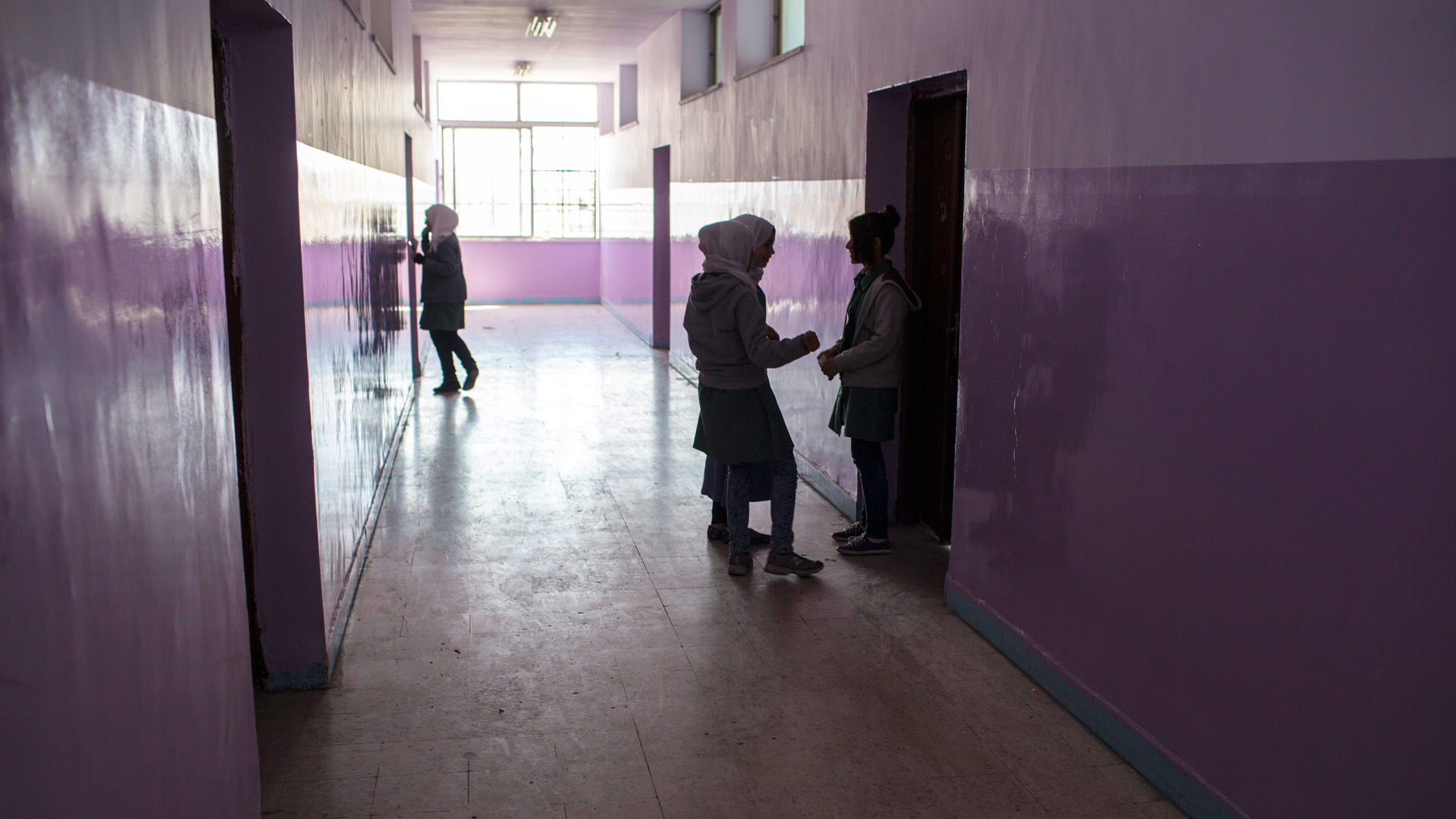 Al Quds double shift school in Amman, Jordan Jordanian and Syrian children are taught in separate shifts.
