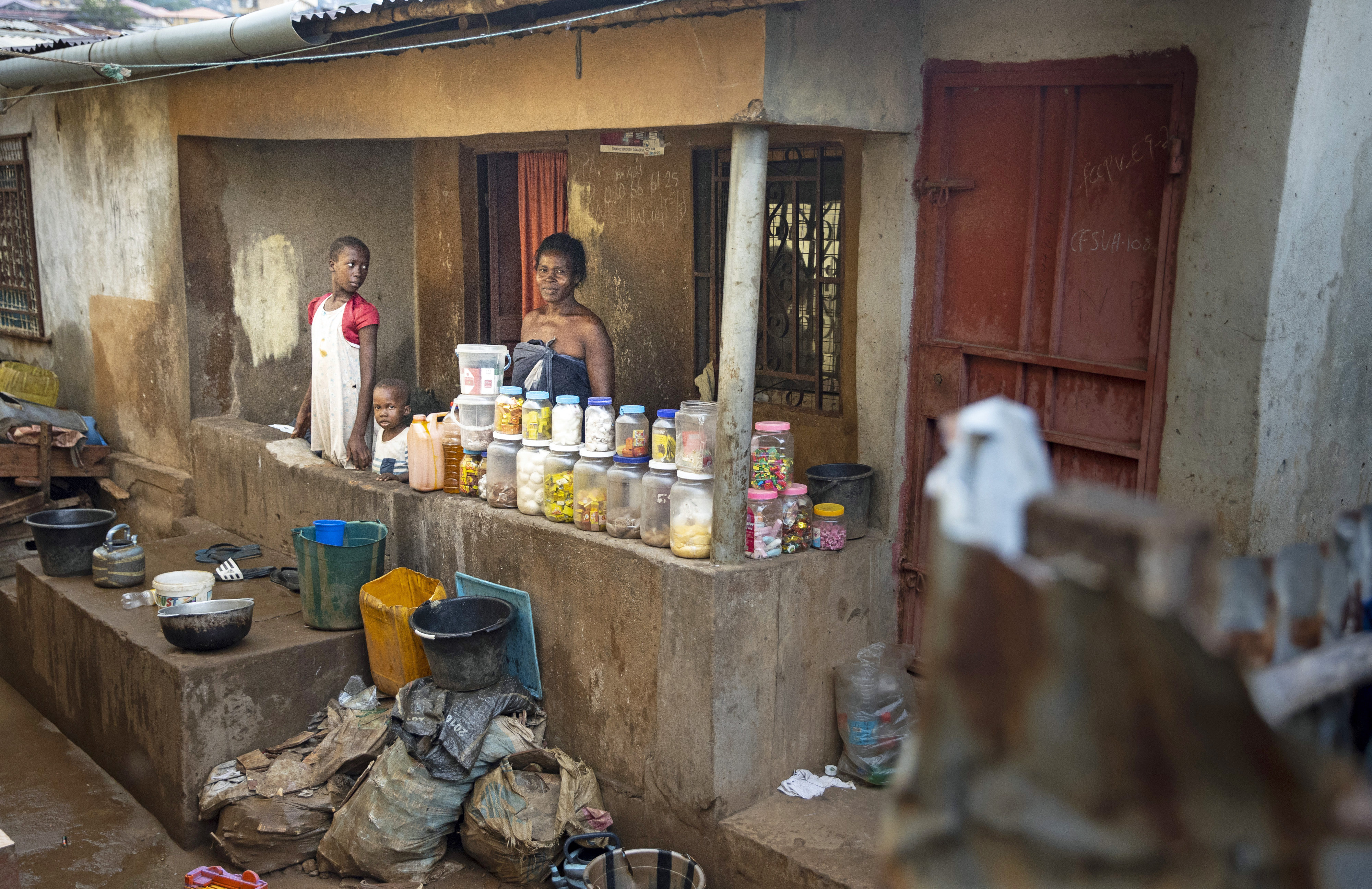 Shopkeeper in the poor neighbourhood of Bomeh Village in Freetown, Sierra Leone