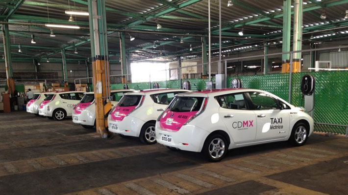 Electric taxis at a charging station in Mexico City, Mexico