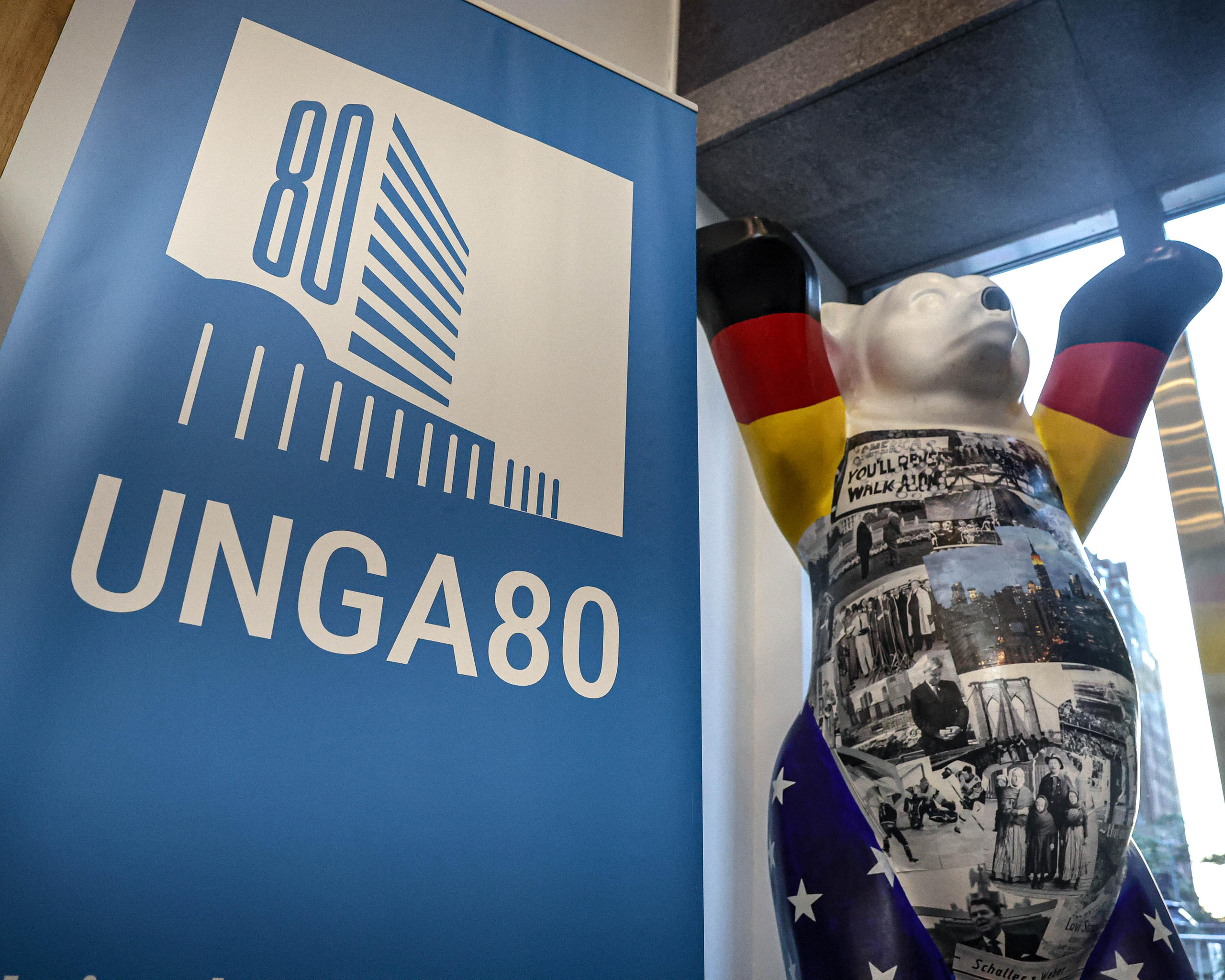 The Berlin Bear next to a banner from the UN