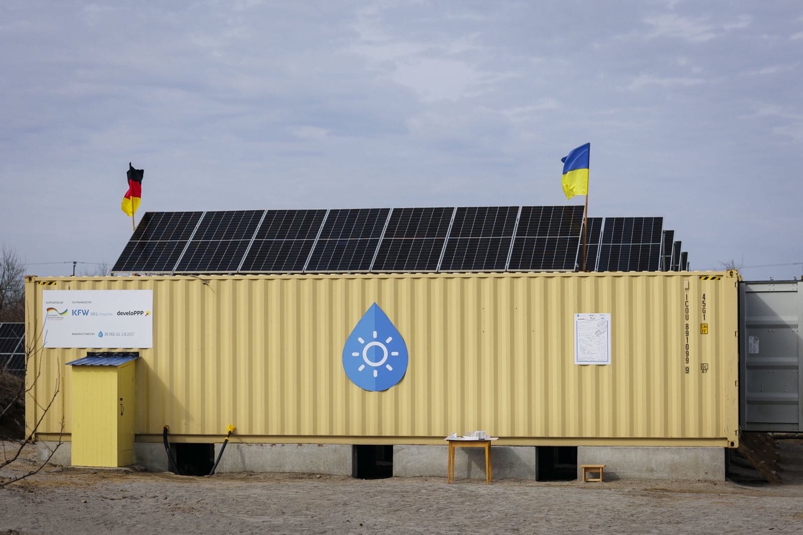 Container housing a water desalination system.