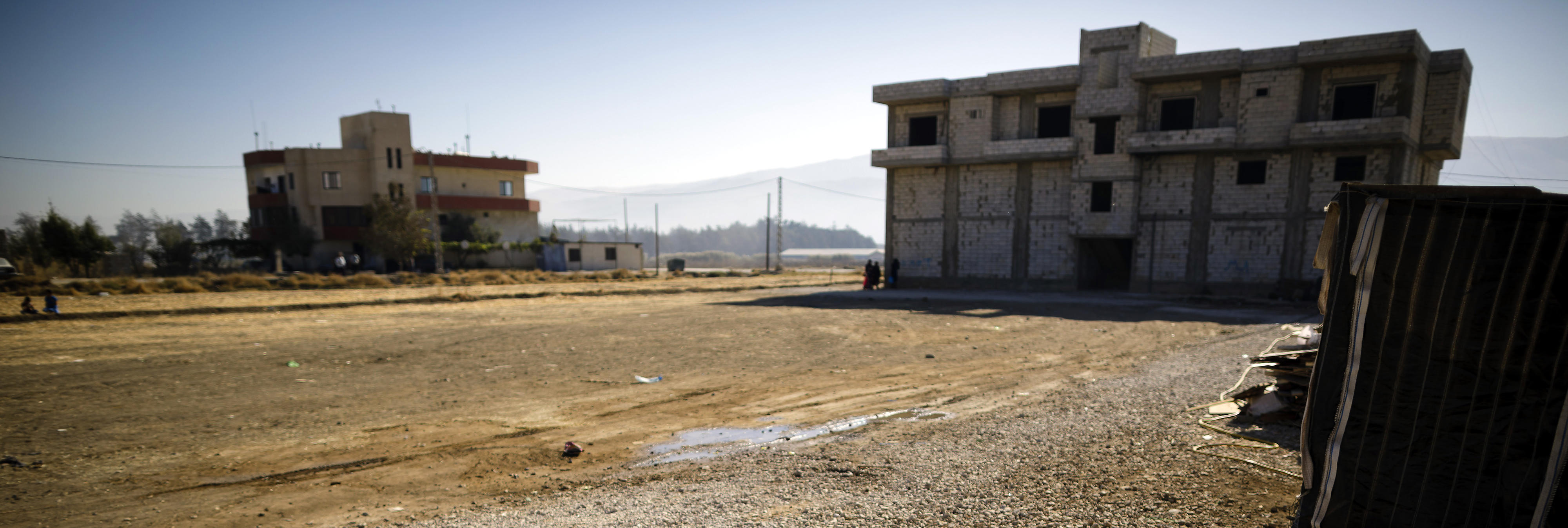 Syrische Frauen und Kinder in einem Lager für Geflüchtete in Bar Elias in der Bekaa-Ebene, Libanon