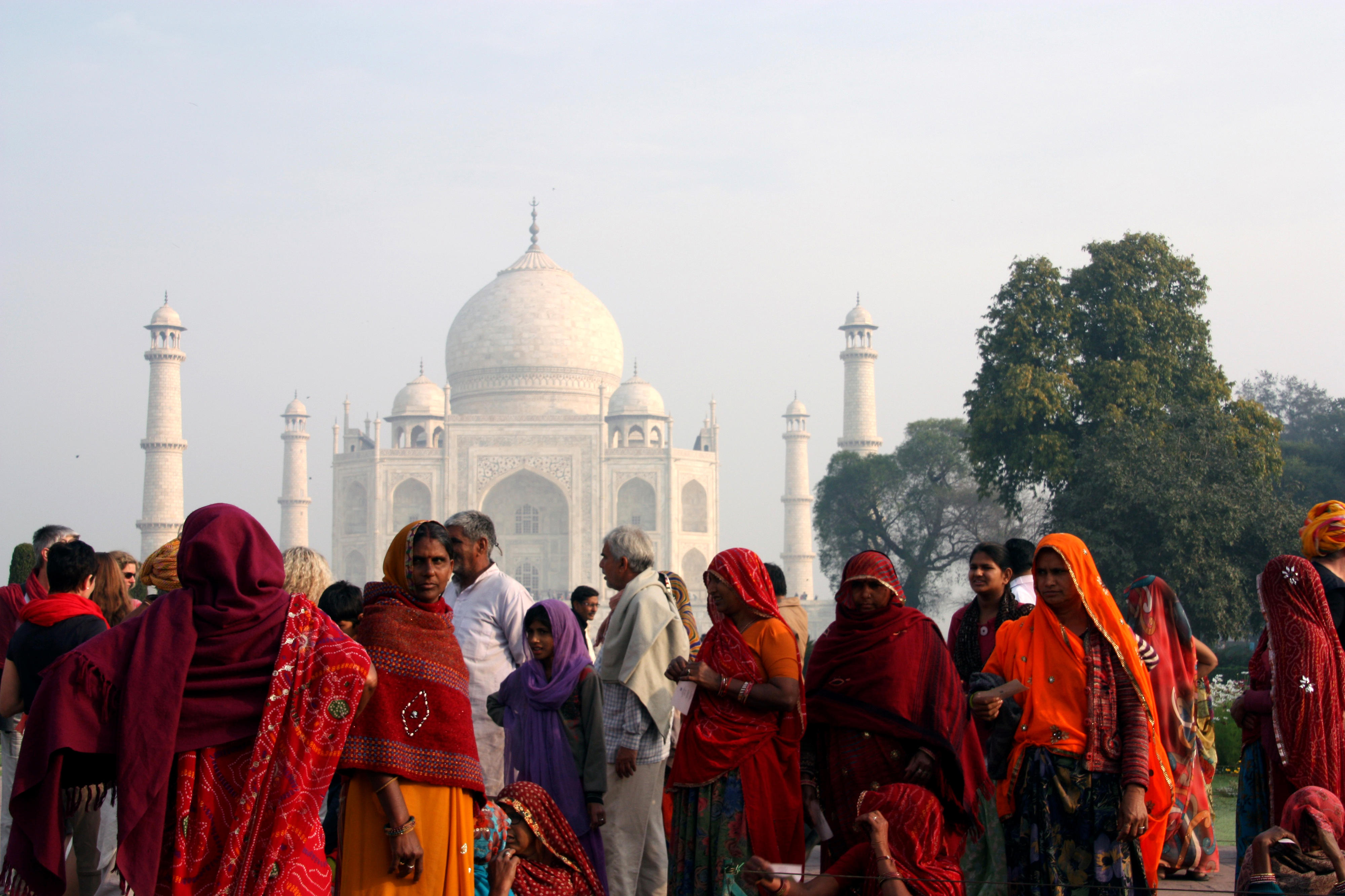 People in front of the Taj Mahal, a mausoleum in the state of Uttar Pradesh, India