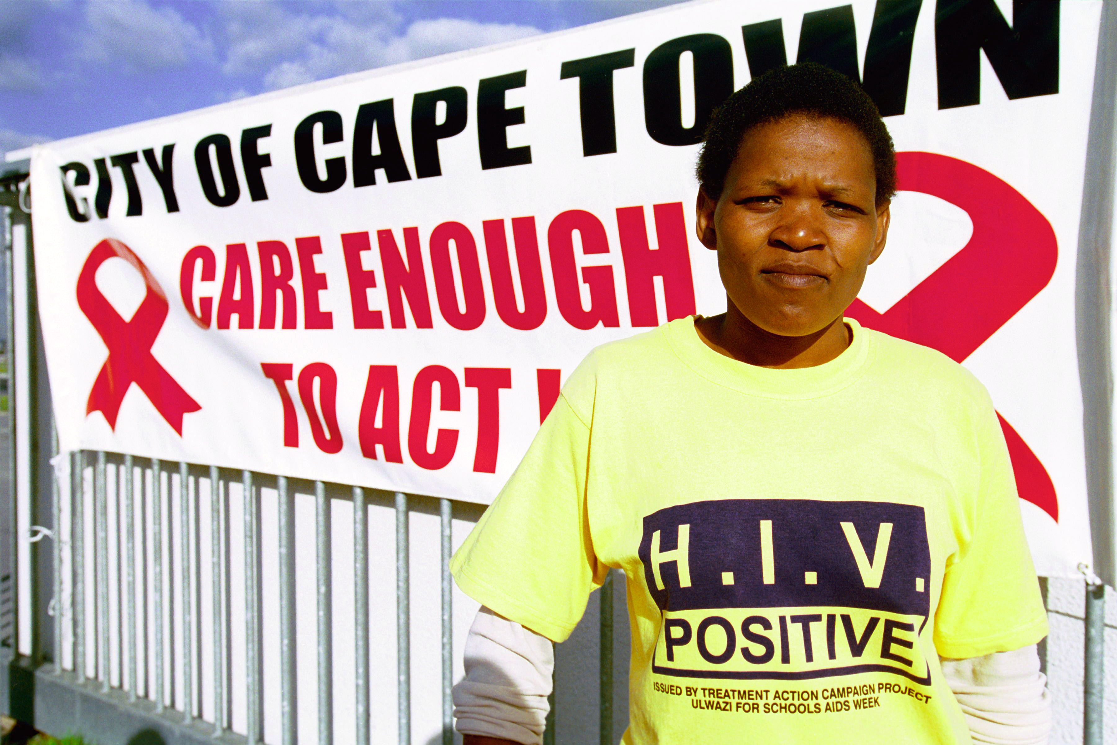 Woman holding an AIDS awareness campaign in South Africa