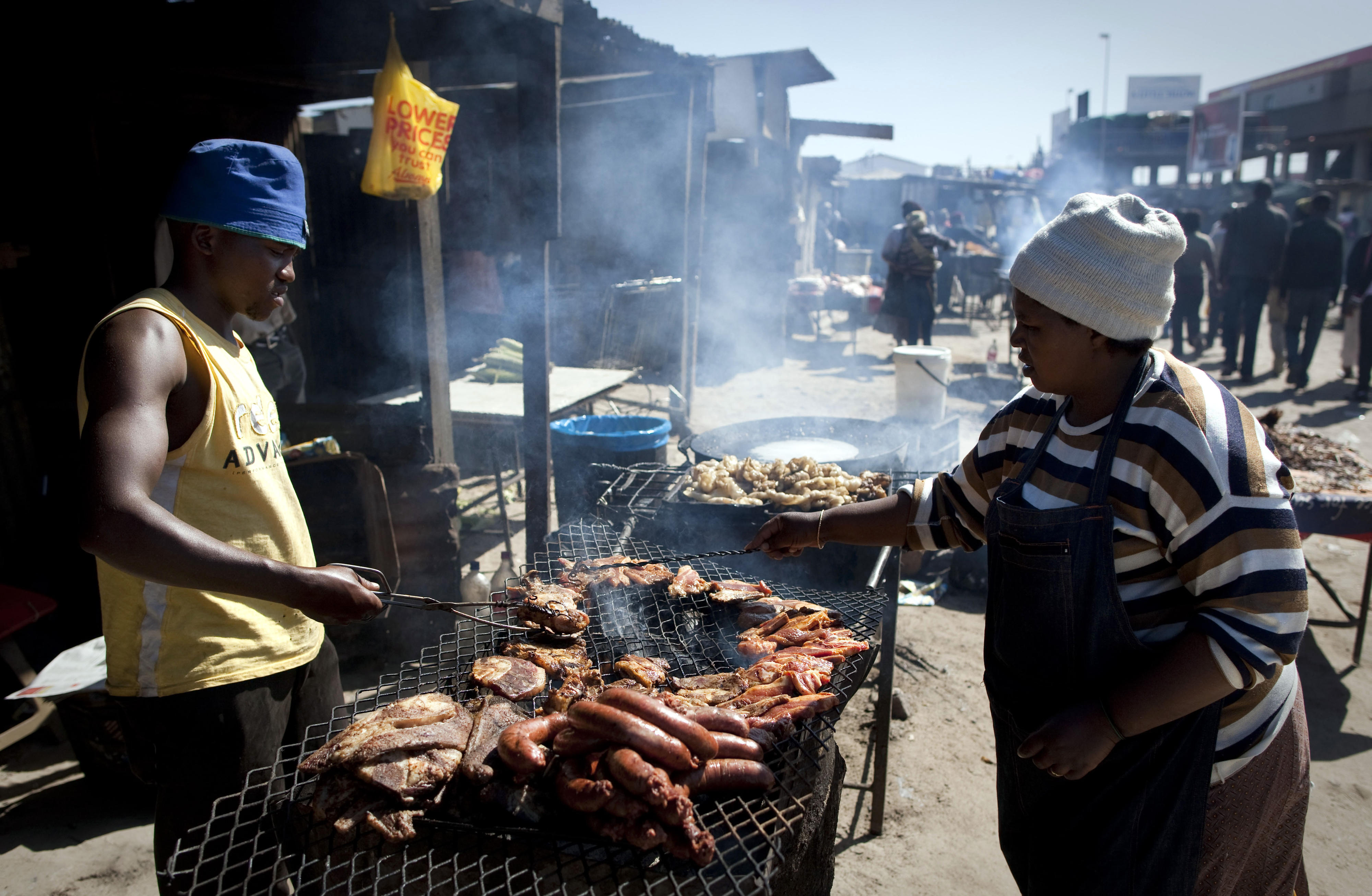 People in a slum on the outskirts of Cape Town