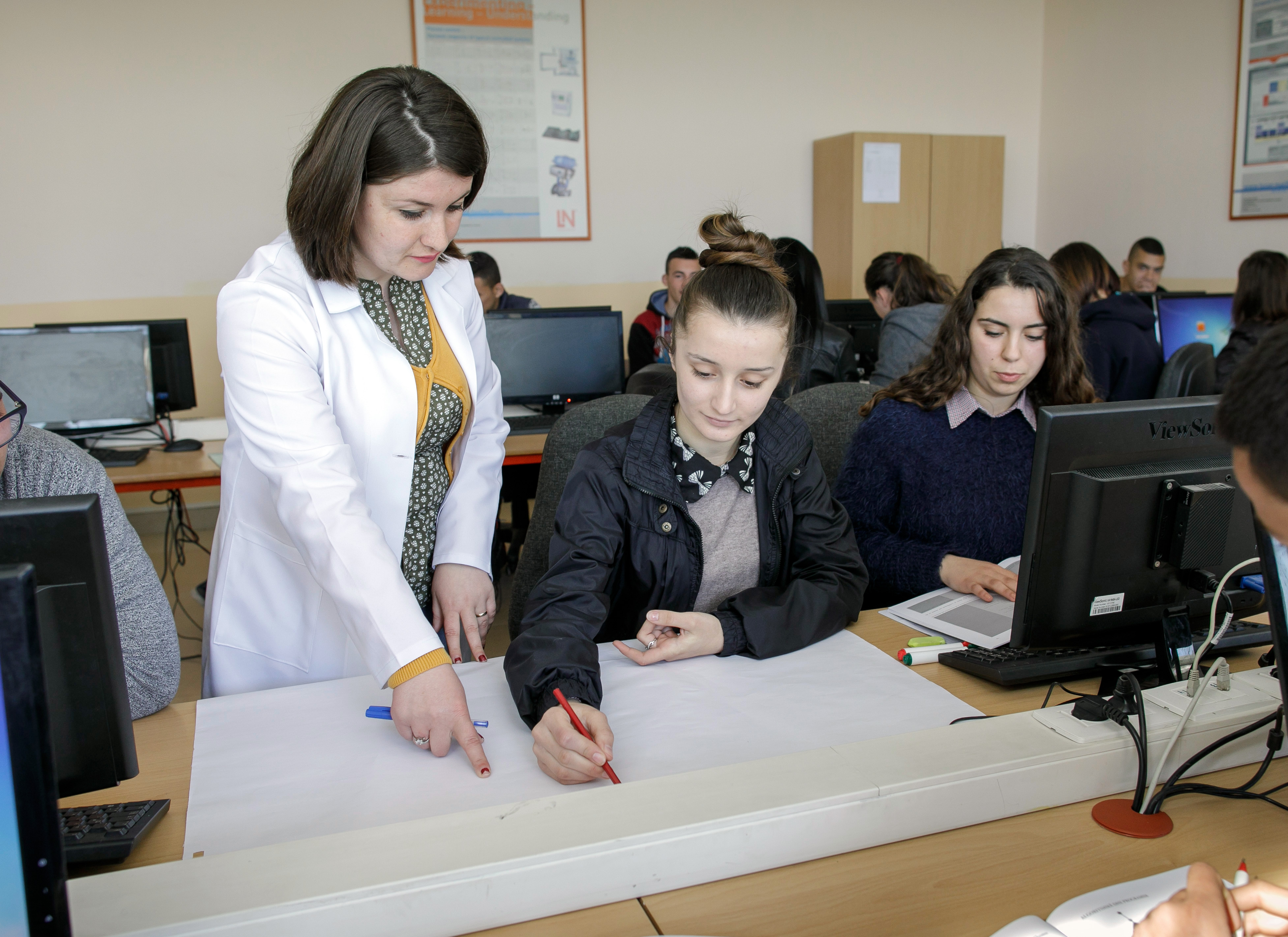 IT training of young people in a vocational school in Kamza, Albania