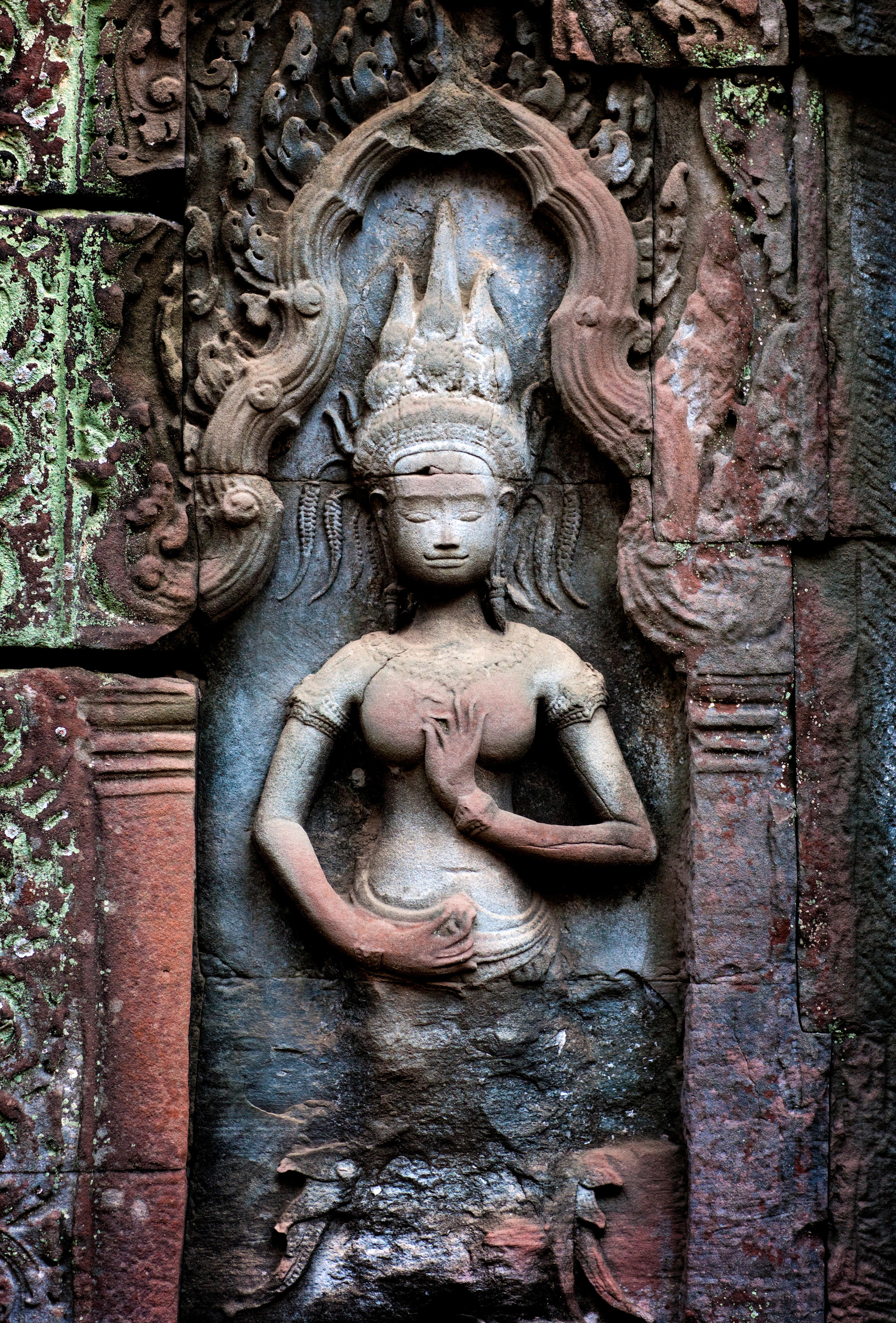 Stone figure in the temple Ta Prohm near Angkor Wat, Cambodia