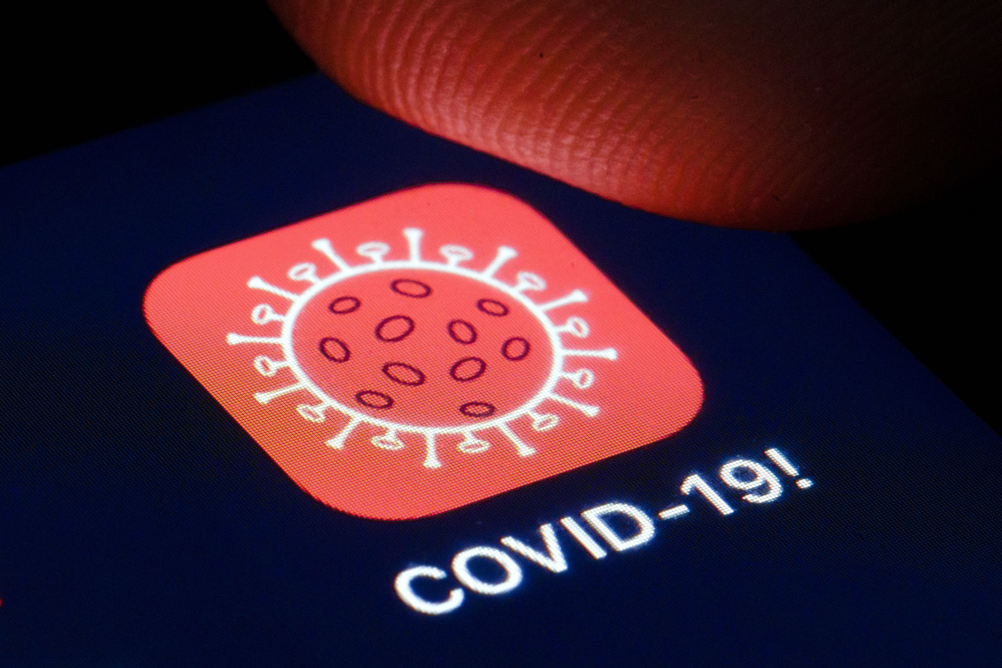 Covid-19-App auf einem Smartphone