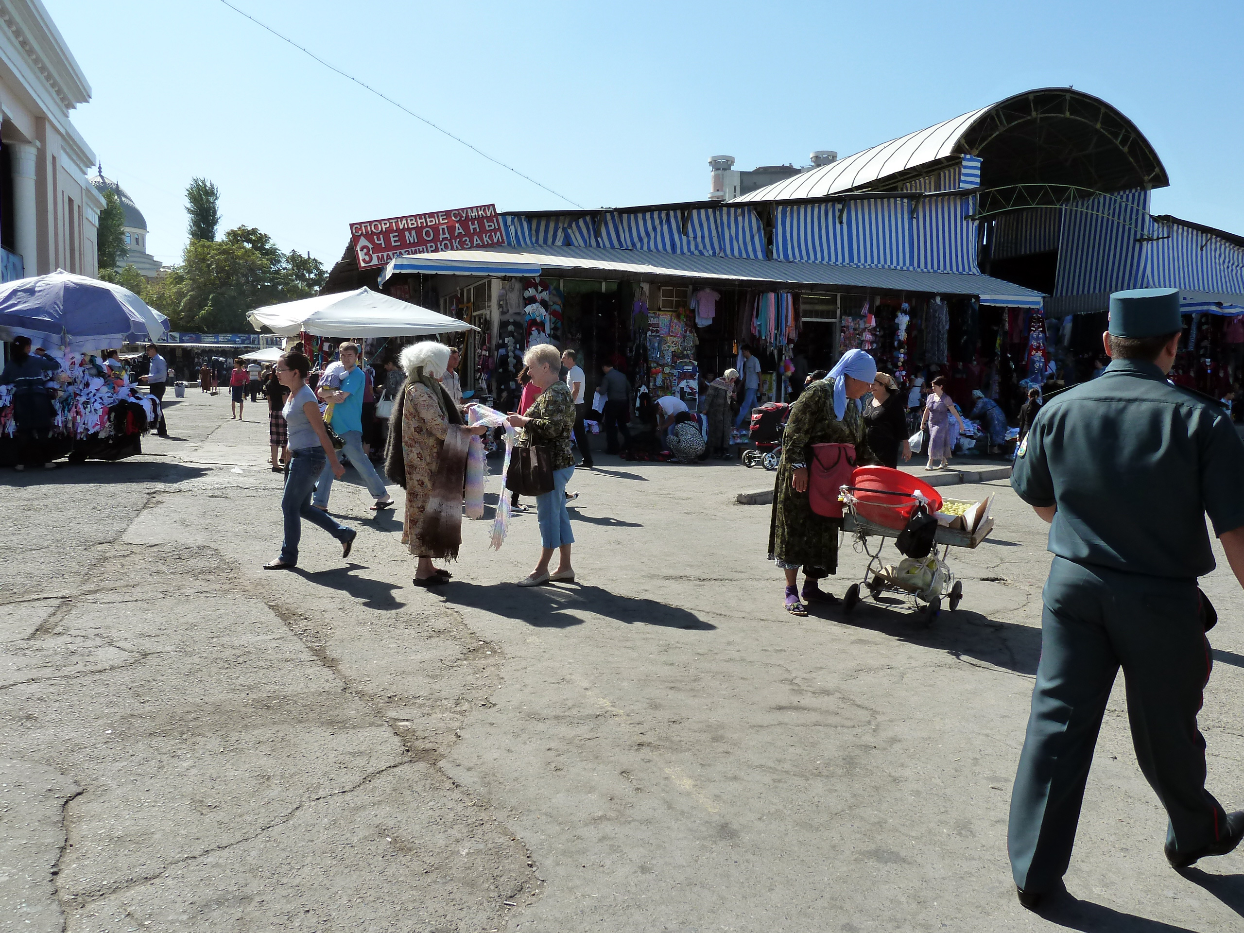 Customers in front of a market hall in Uzbekistan